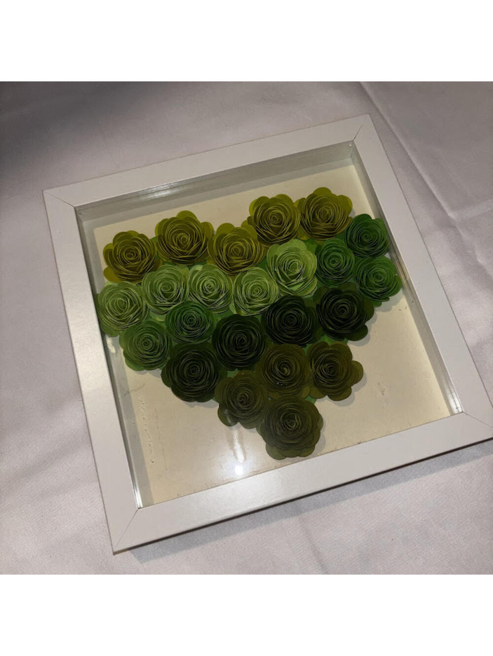 Green rose shadowbox with white frame